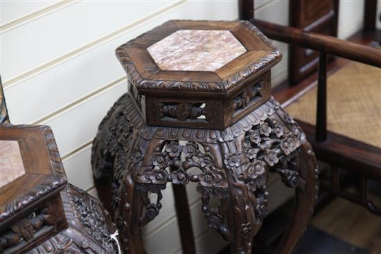 A pair of Chinese hongmu and rouge marble inset hexagonal stands, late 19th century, H.78cm